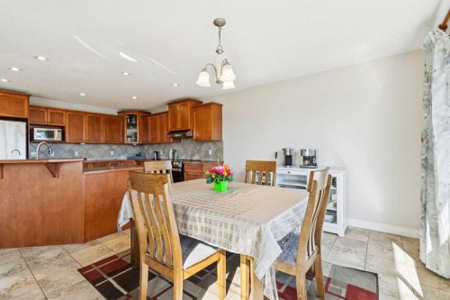 63 Westmount Circle, Okotoks, AB - Indoor Photo Showing Dining Room