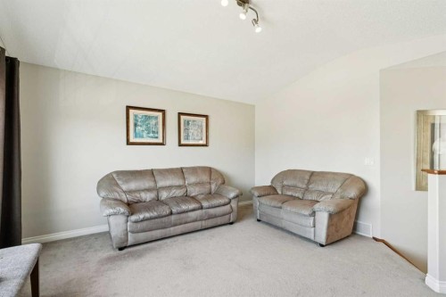 63 Westmount Circle, Okotoks, AB - Indoor Photo Showing Living Room