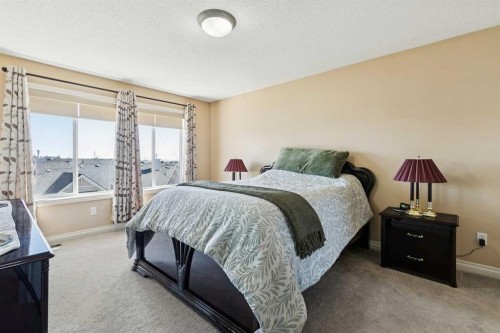 63 Westmount Circle, Okotoks, AB - Indoor Photo Showing Bedroom