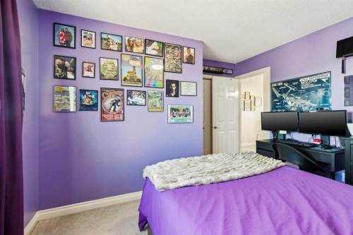 63 Westmount Circle, Okotoks, AB - Indoor Photo Showing Bedroom