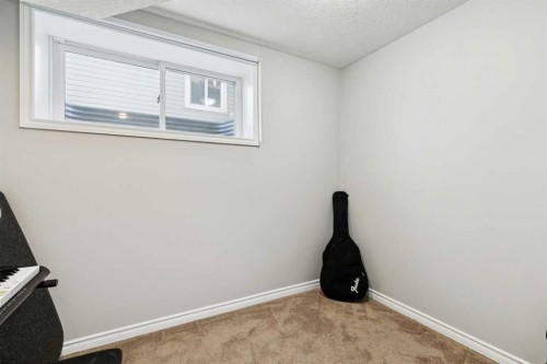 63 Westmount Circle, Okotoks, AB - Indoor Photo Showing Other Room