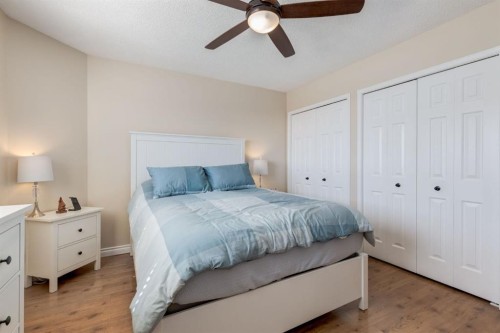 34 Arbour Crest Circle Nw, Calgary, AB - Indoor Photo Showing Bedroom