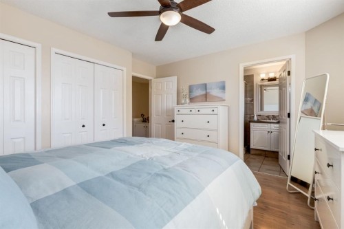 34 Arbour Crest Circle Nw, Calgary, AB - Indoor Photo Showing Bedroom