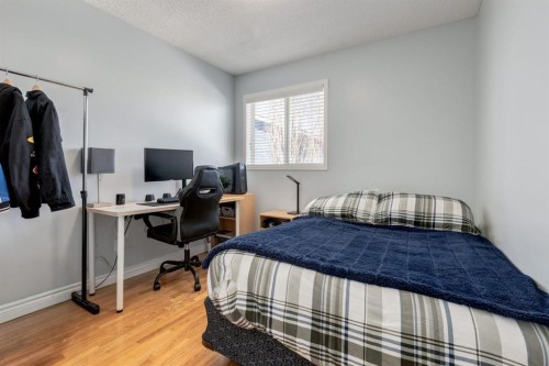 34 Arbour Crest Circle Nw, Calgary, AB - Indoor Photo Showing Bedroom