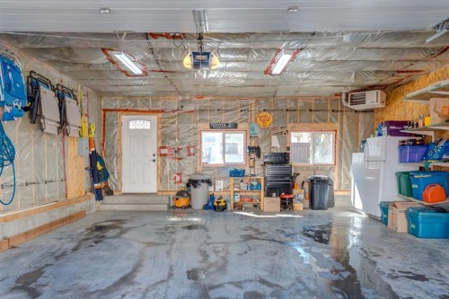 34 Arbour Crest Circle Nw, Calgary, AB - Indoor Photo Showing Garage