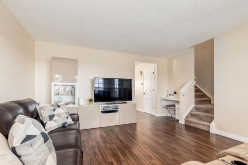 34 Arbour Crest Circle Nw, Calgary, AB - Indoor Photo Showing Living Room