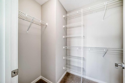 18 Willow Crescent, Okotoks, AB - Indoor With Storage