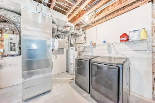 18 Willow Crescent, Okotoks, AB - Indoor Photo Showing Laundry Room