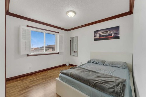 113 West Creek Pond, Chestermere, AB - Indoor Photo Showing Bedroom