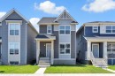67 Corner Glen Gardens Ne, Calgary, AB  - Outdoor With Facade 