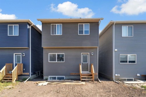 67 Corner Glen Gardens Ne, Calgary, AB - Outdoor With Exterior