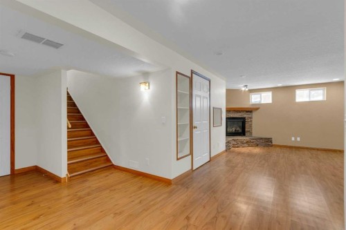 31 Gateway Drive Sw, Calgary, AB - Indoor With Fireplace