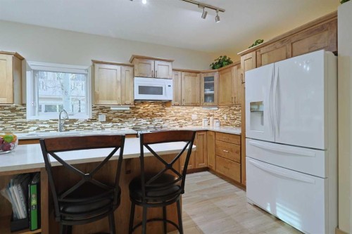 13 Scimitar Heath Nw, Calgary, AB - Indoor Photo Showing Other Room