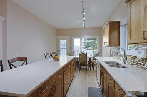 13 Scimitar Heath Nw, Calgary, AB - Indoor Photo Showing Kitchen With Double Sink