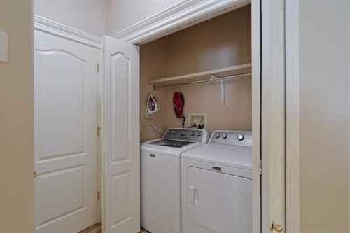 13 Scimitar Heath Nw, Calgary, AB - Indoor Photo Showing Laundry Room
