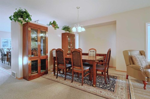 13 Scimitar Heath Nw, Calgary, AB - Indoor Photo Showing Dining Room