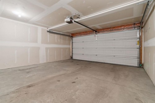 10 Auburn Bay Common Se, Calgary, AB - Indoor Photo Showing Garage