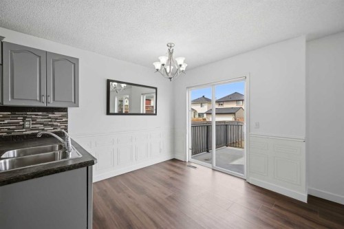 50 Saddleback Road Ne, Calgary, AB - Indoor Photo Showing Kitchen With Double Sink