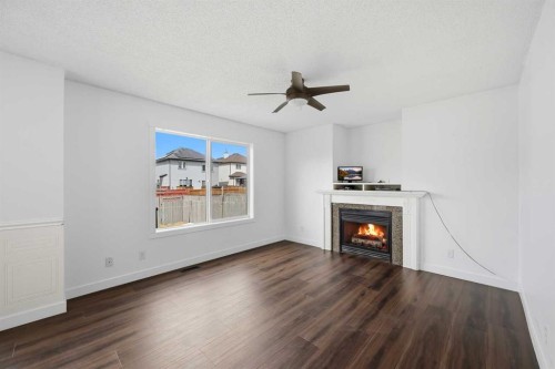 50 Saddleback Road Ne, Calgary, AB - Indoor Photo Showing Living Room With Fireplace