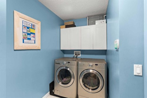180 Cranfield Park Se, Calgary, AB - Indoor Photo Showing Laundry Room