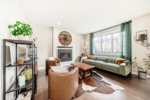156 Masters Rise Se, Calgary, AB - Indoor Photo Showing Living Room With Fireplace