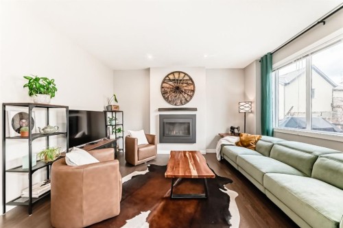 156 Masters Rise Se, Calgary, AB - Indoor Photo Showing Living Room With Fireplace