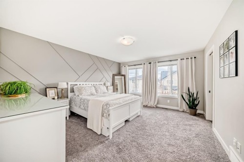 156 Masters Rise Se, Calgary, AB - Indoor Photo Showing Bedroom
