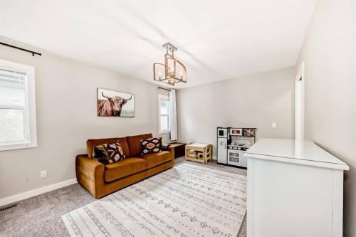 156 Masters Rise Se, Calgary, AB - Indoor Photo Showing Living Room