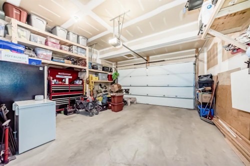 156 Masters Rise Se, Calgary, AB - Indoor Photo Showing Garage