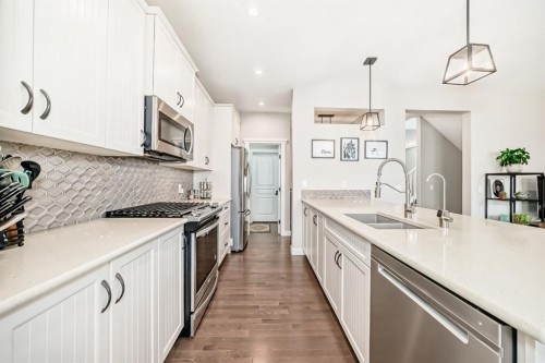 156 Masters Rise Se, Calgary, AB - Indoor Photo Showing Kitchen With Stainless Steel Kitchen With Double Sink With Upgraded Kitchen
