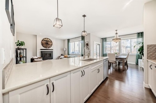 156 Masters Rise Se, Calgary, AB - Indoor Photo Showing Kitchen With Double Sink With Upgraded Kitchen