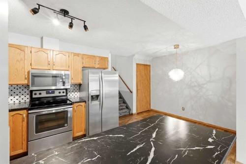 4B Millview Way Sw, Calgary, AB - Indoor Photo Showing Kitchen