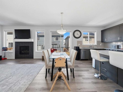 62 Yorkstone Heath Sw, Calgary, AB - Indoor With Fireplace