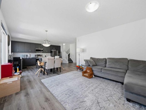 62 Yorkstone Heath Sw, Calgary, AB - Indoor Photo Showing Living Room