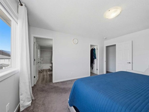 62 Yorkstone Heath Sw, Calgary, AB - Indoor Photo Showing Bedroom