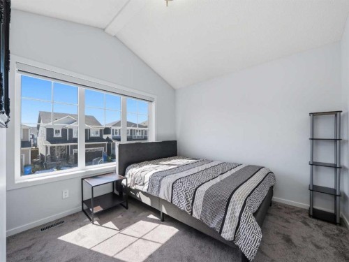 62 Yorkstone Heath Sw, Calgary, AB - Indoor Photo Showing Bedroom