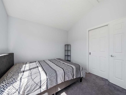 62 Yorkstone Heath Sw, Calgary, AB - Indoor Photo Showing Bedroom