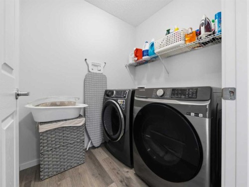 62 Yorkstone Heath Sw, Calgary, AB - Indoor Photo Showing Laundry Room