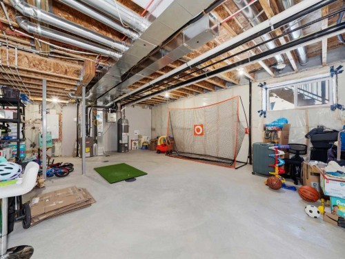 62 Yorkstone Heath Sw, Calgary, AB - Indoor Photo Showing Basement
