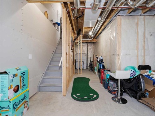 62 Yorkstone Heath Sw, Calgary, AB - Indoor Photo Showing Basement