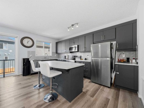 62 Yorkstone Heath Sw, Calgary, AB - Indoor Photo Showing Kitchen With Upgraded Kitchen