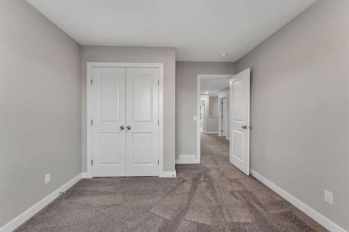 24 Corner Glen Green Ne, Calgary, AB - Indoor Photo Showing Other Room