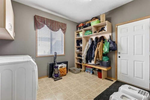 765 Qualicum Beach Bay, Chestermere, AB - Indoor Photo Showing Laundry Room