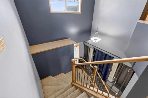 765 Qualicum Beach Bay, Chestermere, AB - Indoor Photo Showing Other Room
