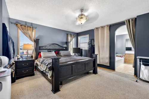 765 Qualicum Beach Bay, Chestermere, AB - Indoor Photo Showing Bedroom