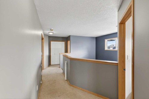 765 Qualicum Beach Bay, Chestermere, AB - Indoor Photo Showing Other Room
