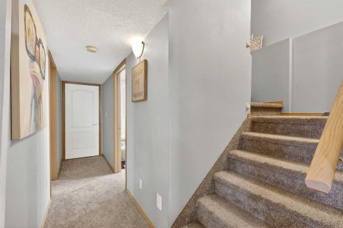 765 Qualicum Beach Bay, Chestermere, AB - Indoor Photo Showing Other Room