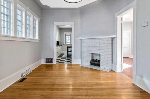 226 11 Street Nw, Calgary, AB - Indoor With Fireplace