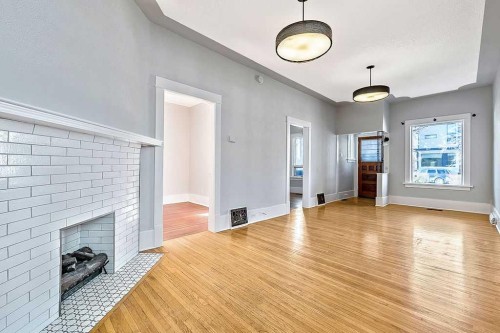 226 11 Street Nw, Calgary, AB - Indoor With Fireplace