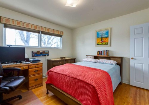 38 Spokane Street Sw, Calgary, AB - Indoor Photo Showing Bedroom